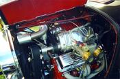 Twin Magnacharger Supercharger with side draft Dellorto carburetors -- Notice the 24 K gold plated velocity stacks.