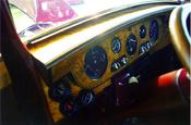 Rolls Royce burled wood dashboard & gauges -- Look close & you can see the RR in the large gauge.