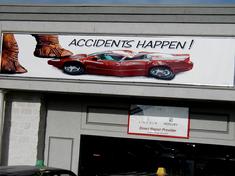 This SIGN is on an auto body shop.  The owner wanted a picture that says it all.  This was Gary's idea...It definitely catches attention!