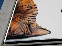 DETAIL- This SIGN is on an auto body shop.  The owner wanted a picture that says it all.  This was Gary's idea...It definitely catches attention!