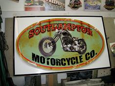 This sign is PAINTED on Aluminum to look as though it is old & rusting & scratched.