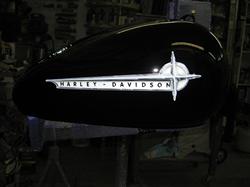 Gary, The Local Brush, Airbrushed the Harley Davidson emblem.  The faux chrome looks amazingly real.