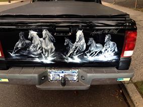 Airbrushed horses, clear coated & mounted onto the pickup