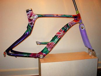 Carbon Fiber Race Bicycle Frame painted with a purple pearl fade from light to dark &  Airbrushed realistic exotic flowers