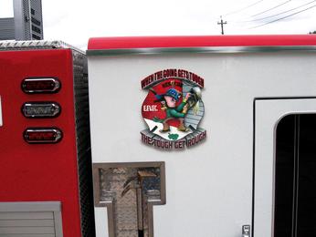 The location of East Farmingdale V F Company patch is high above the doors of the cab.