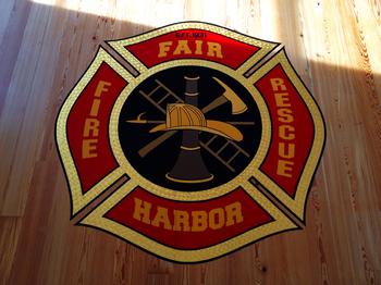 Fair Harbor Fire Dept. Logo, hand  painted on the floor of the new building.