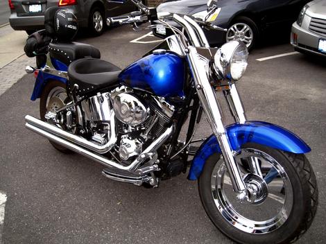 Airbrushed Art under the Candy Apple Blue Harley Davidson