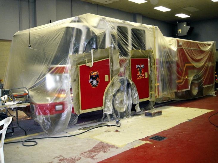 Elmont Engine 1 - masked & completely covered in plastic during the AIRBRUSHING procedure.