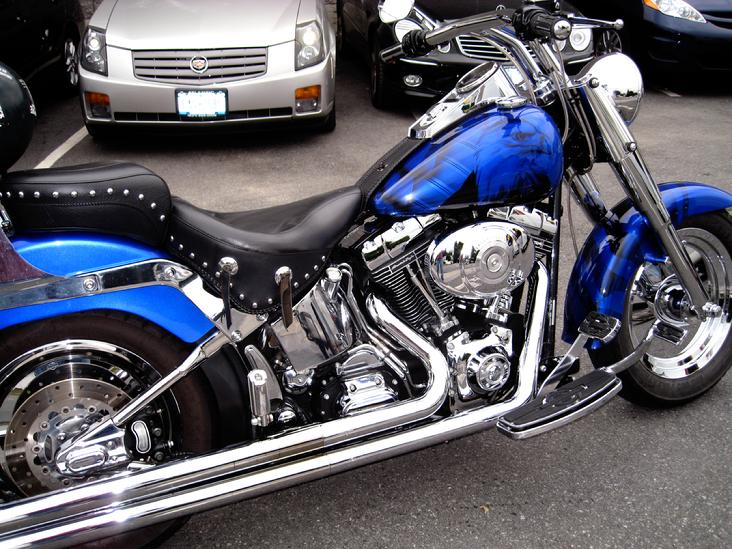 100 Year Anniversary Edition Harley Fat Boy with AIRBRUSHED ART under the Candy Apple Blue paint