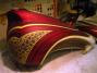 Fine Line Red & Beige Pinstriping outlines art work on Custom made Bike Tank